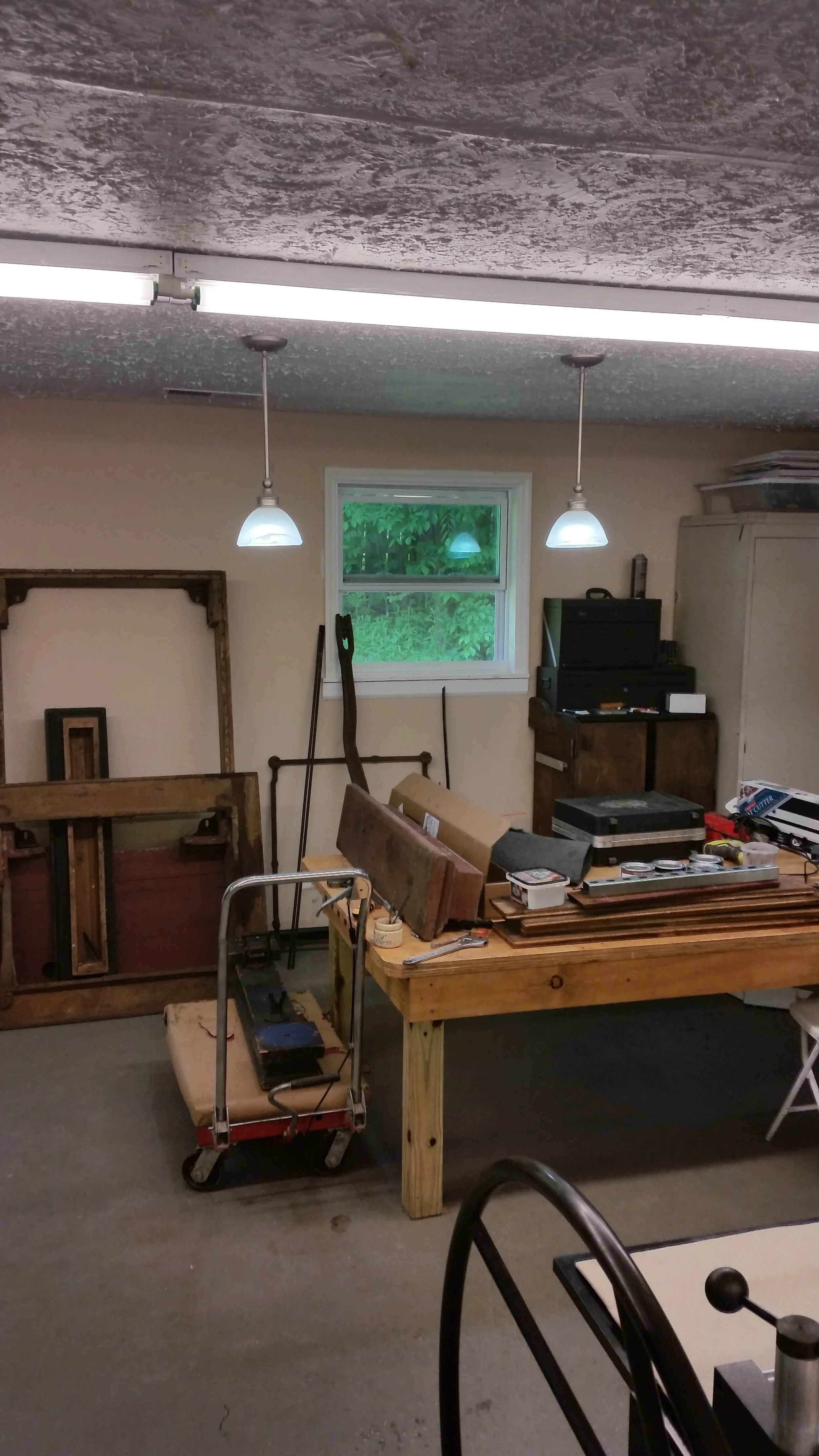 The scale parts stacked around our worktable