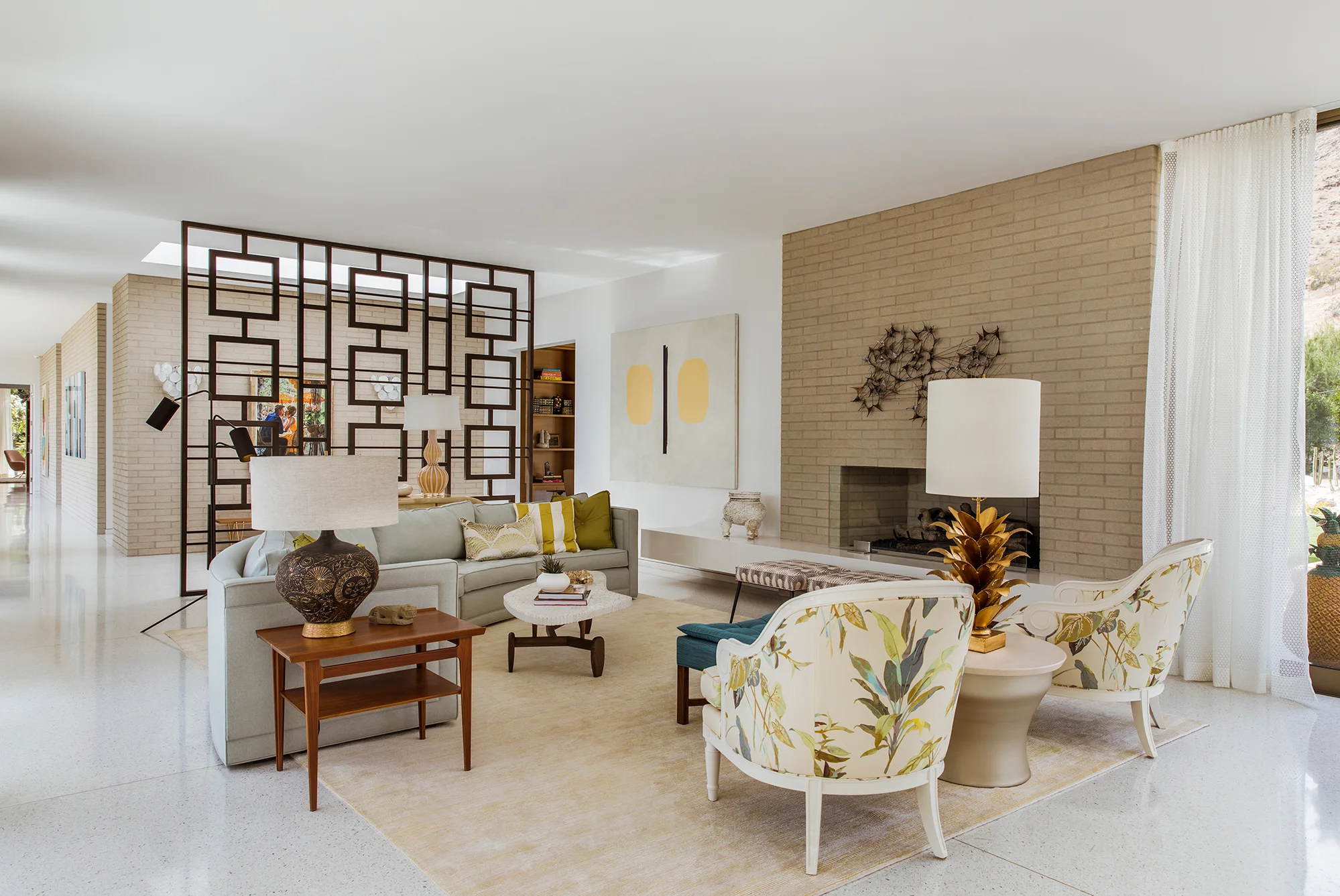 Nesen had to balance the husband’s love of contemporary design with the wife’s penchant for a lighthearted take on the 1960s Palm Springs genre. “The architectural envelope is basically clean and modern,” the designer says, in keeping with the husband’s tastes, while, “The wife loves the pattern-on-pattern, granny-chic quality of old Palm Springs. Using that as a jumping off point, we wove together color and texture to create that playfulness.” - Luxe Magazine March-April 2018