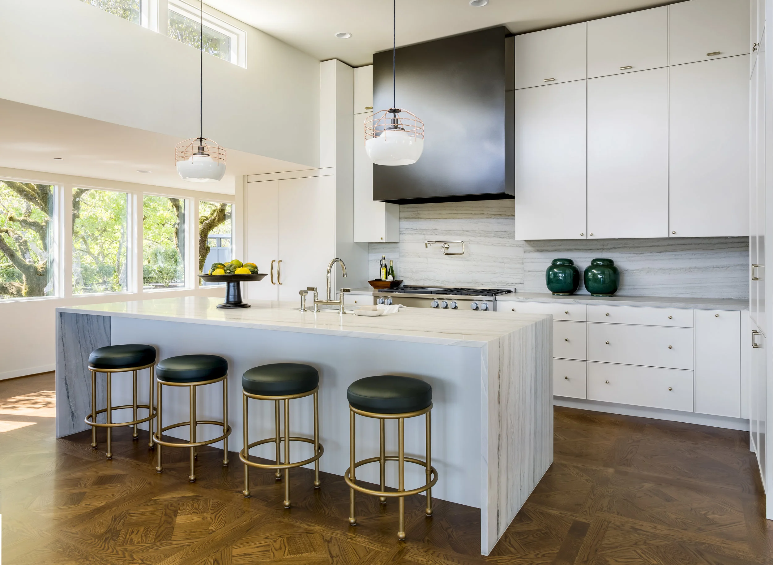 Every surface—walls and flooring, fixtures and appliances—was evaluated for its merit and contribution to the whole, and when needed, tired or trite elements were replaced. While retaining the original simplicity, the residence now includes the amenities and technology of today.
