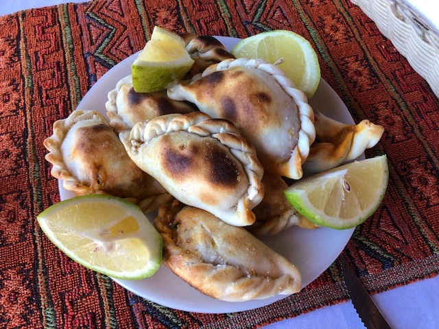 A sampling from El Rancho Felix in Tafi de Valle in Tucuman Province. Note the limon (lime) which is great addition squeezed into the filling between bites.