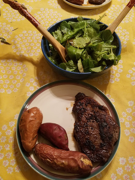 Our plates are looking a lot like this lately, too! Enjoying the bounty of salad, sweet potatoes, and of course, steak. 
