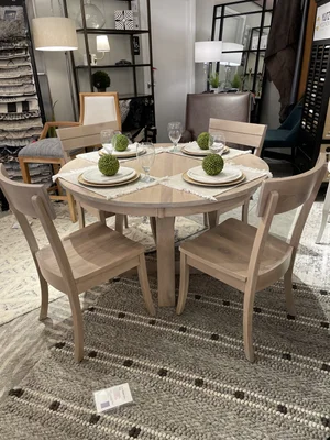 Customizable Round Estate Dining Table — Miller's Home Furnishings