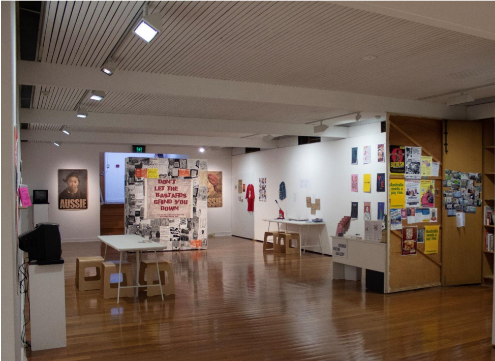 Don’t Let The Bastards Grind You Down  exhibition photo by Lisa Jacomos.