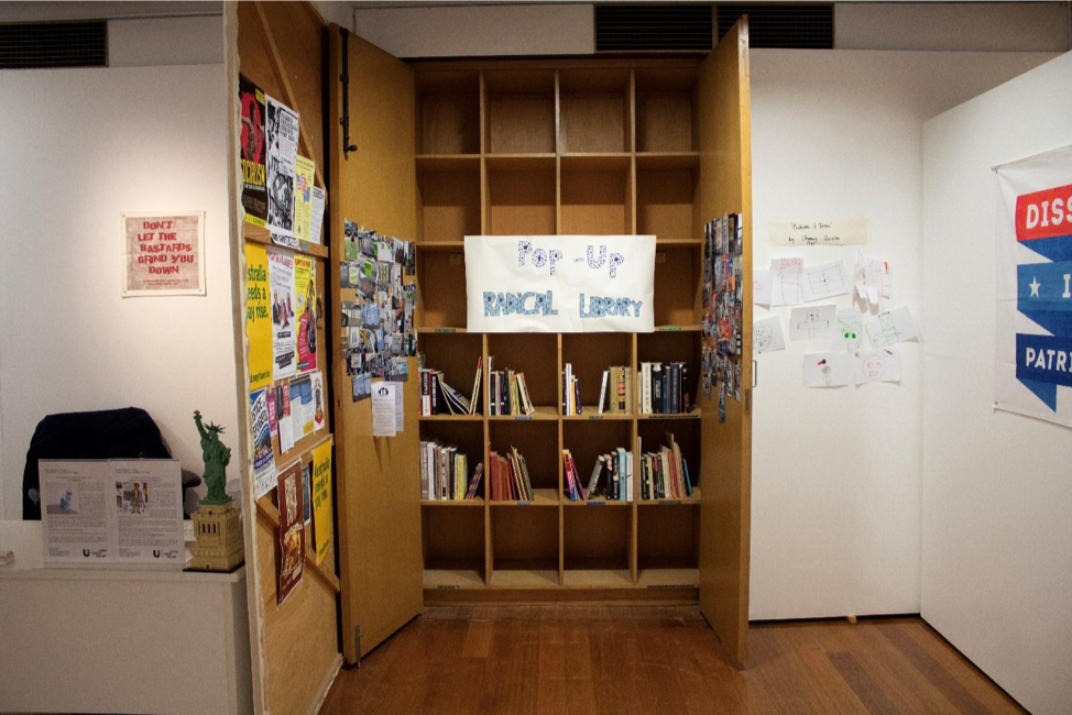 Don’t Let The Bastards Grind You Down  exhibition photo by Lisa Jacomos.