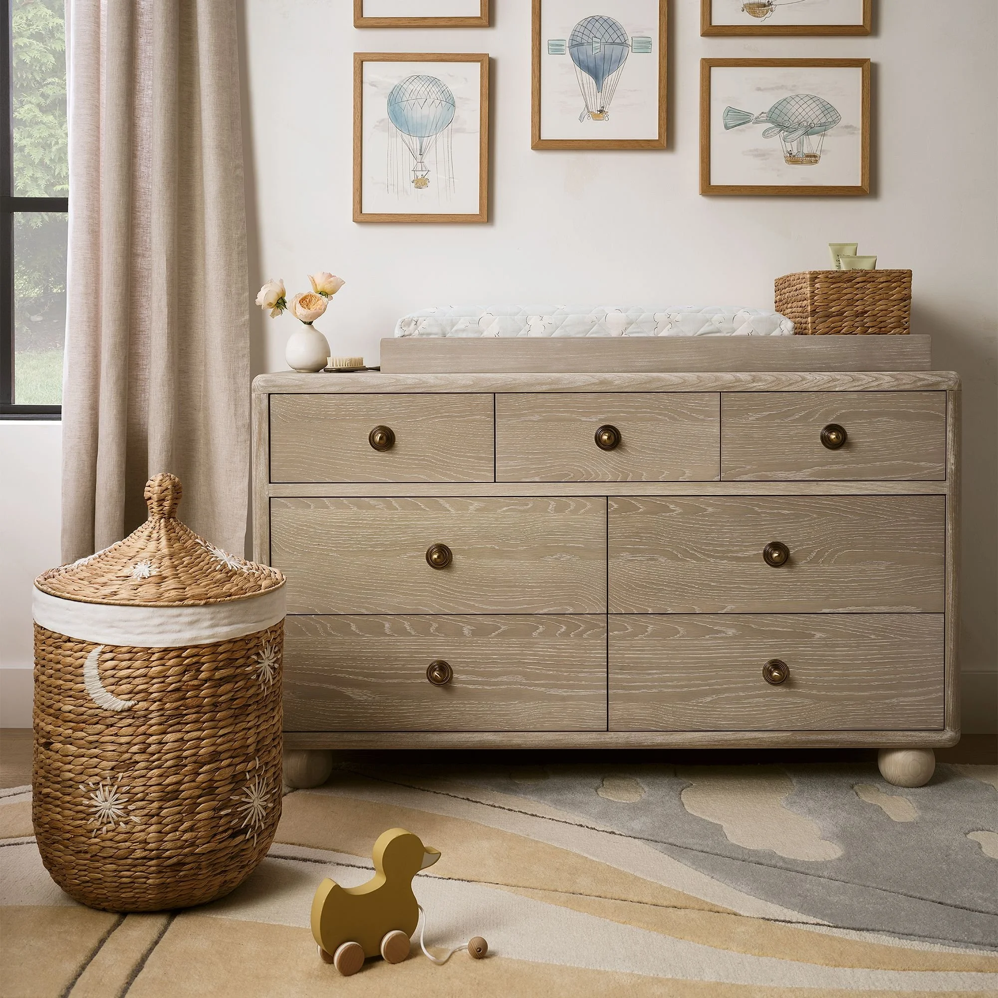 joseph-altuzarra-sphere-foot-7-drawer-changing-table-56-5-xl.jpg