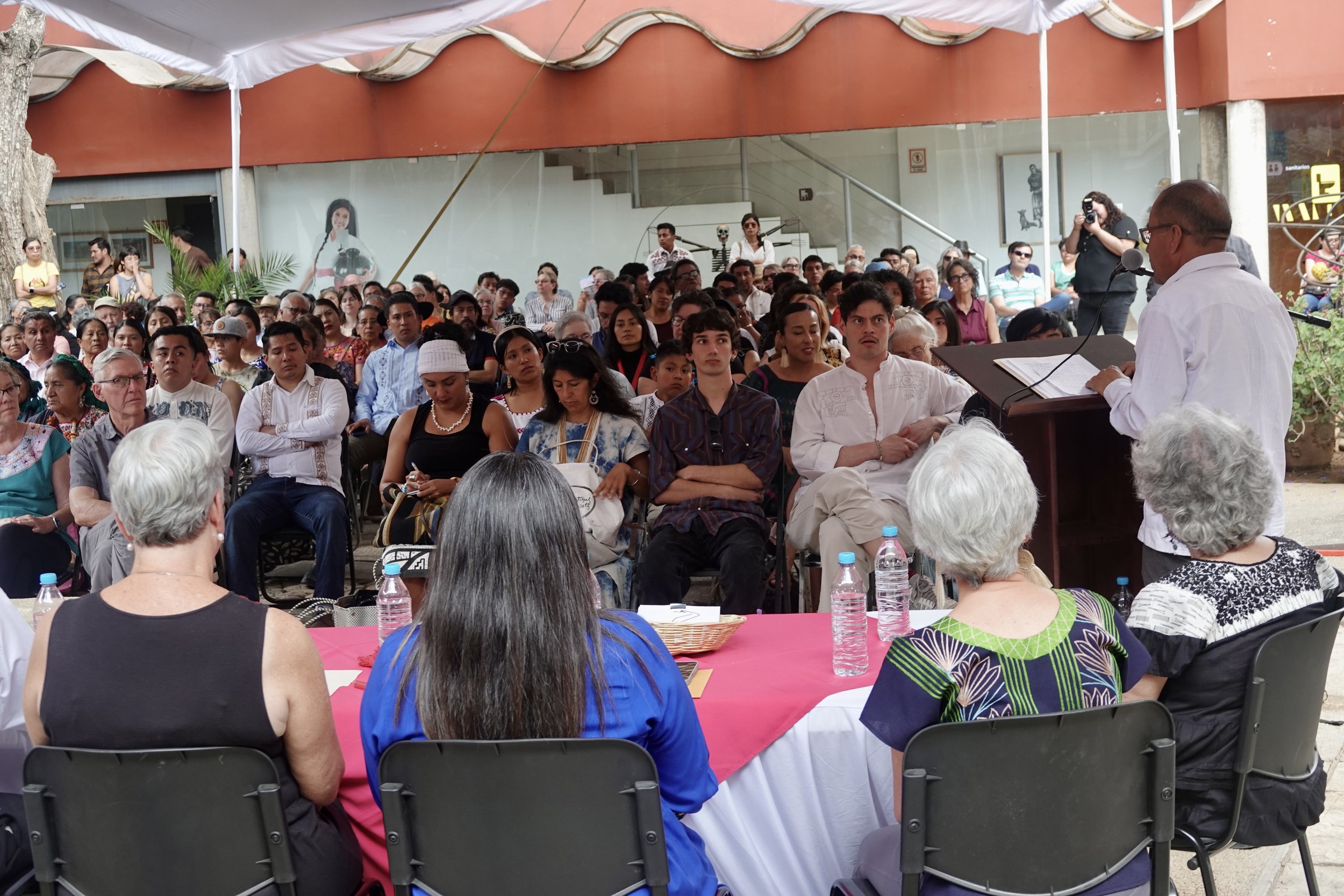 Carlo Magno addressing the audience.jpeg