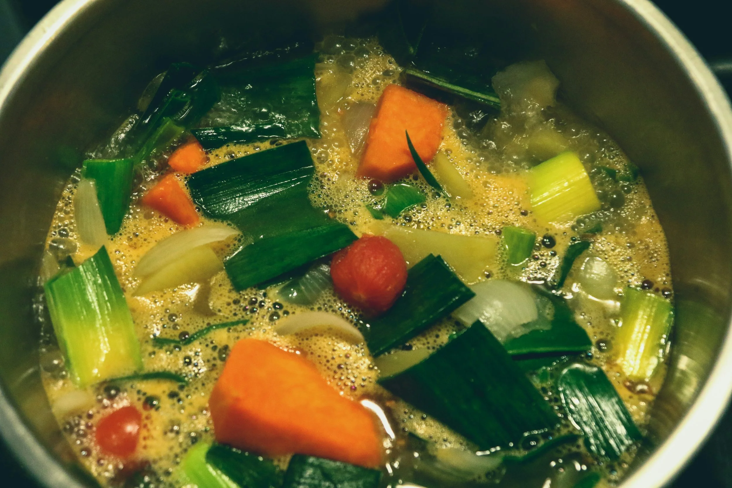 stir fry vegetables in a pot