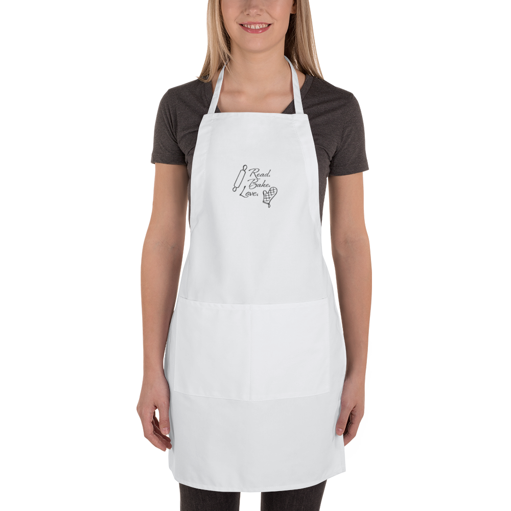 ReadBakeLove_aprons_000000_mockup_Front_Womens_White.png
