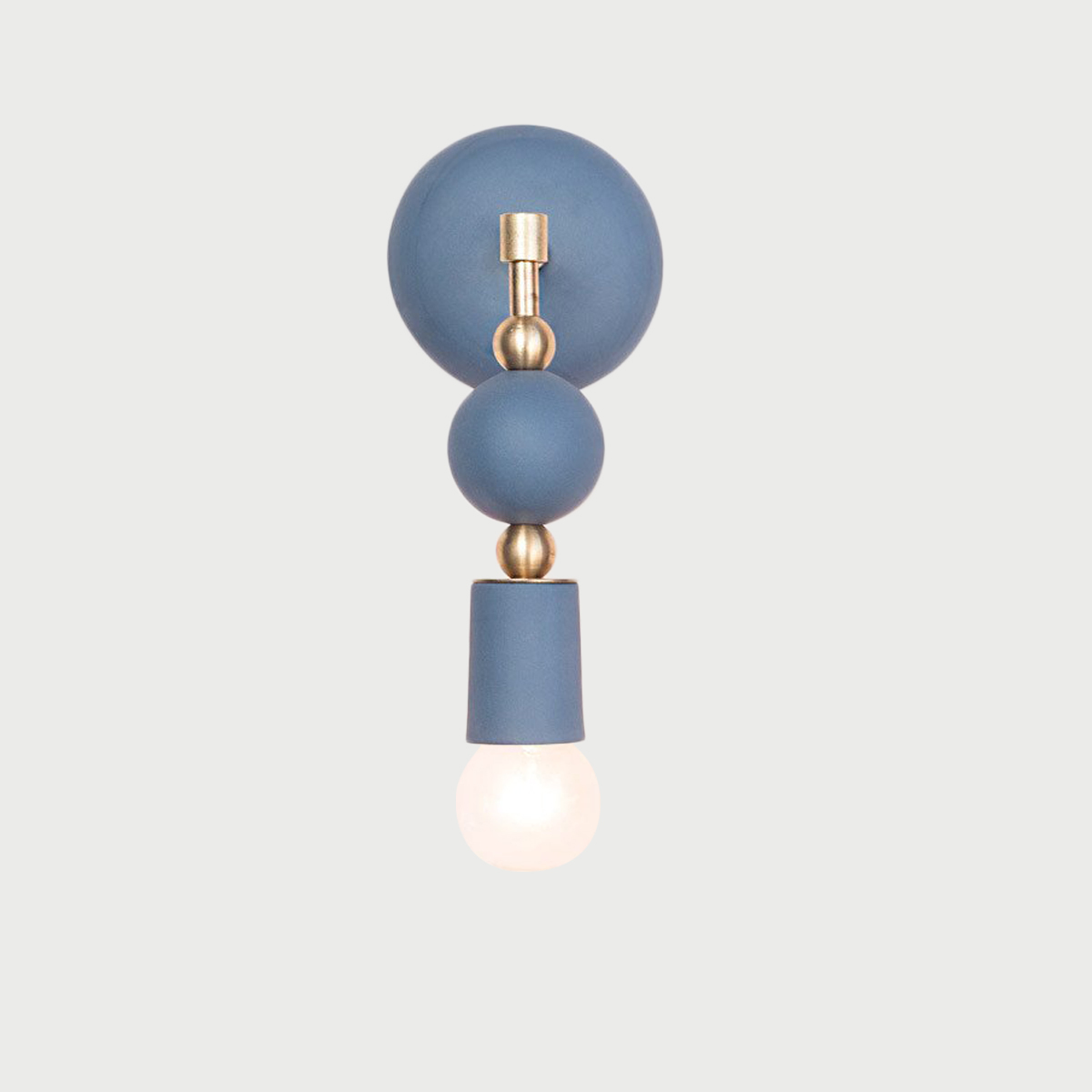 Ball_sconce_lit_navy.jpg