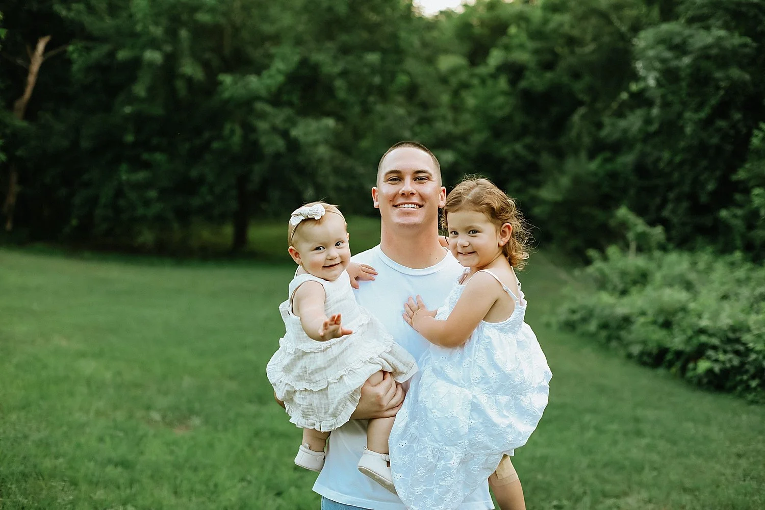  police father holds two baby girls by Jessie Shaw Photo 
