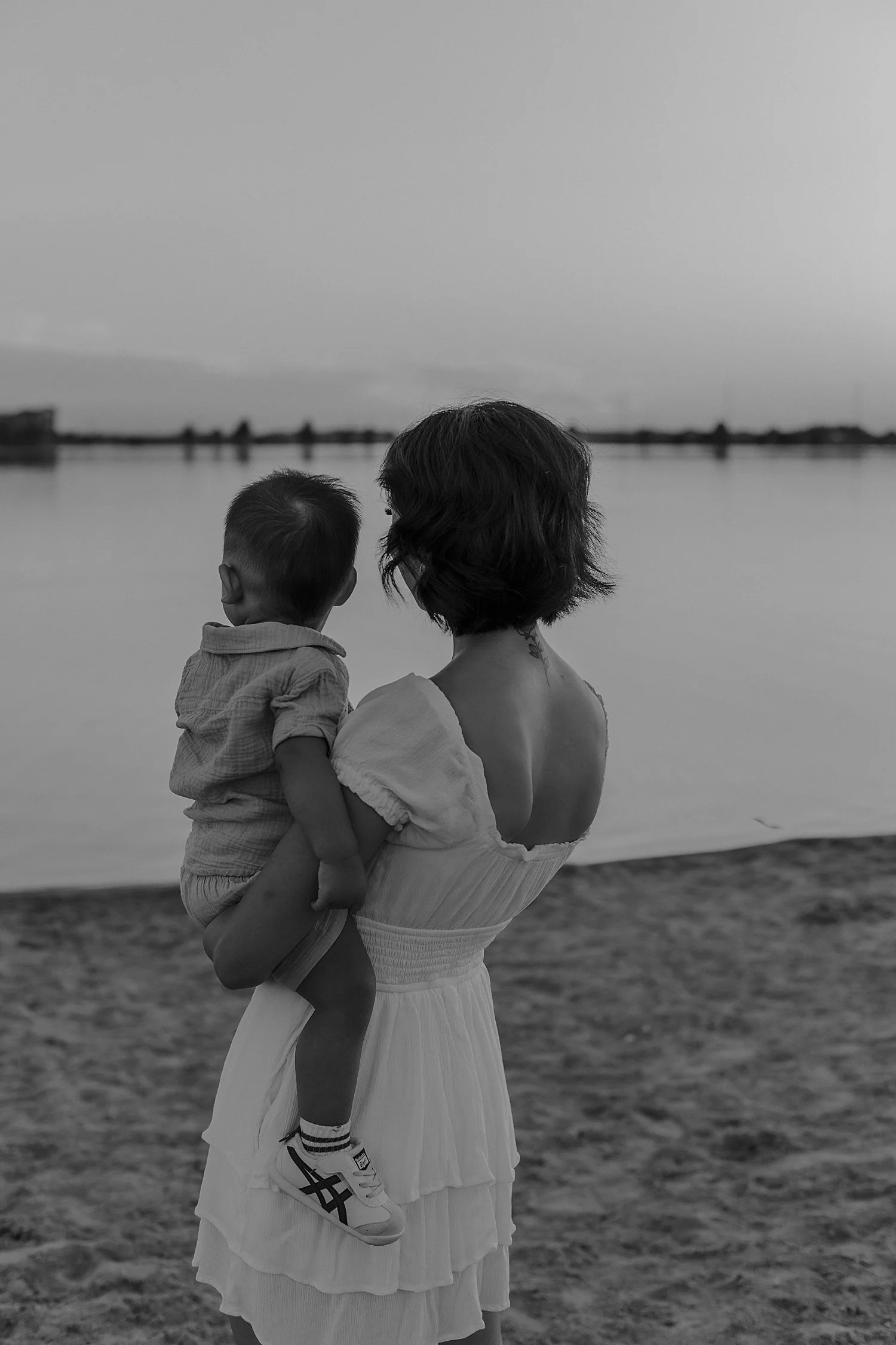  mother and baby stand, looking out over the water by Round Rock family photographer 
