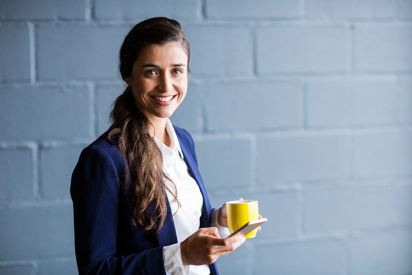 bigstock-Portrait-of-smiling-businesswo-140363225-BAJA.jpg