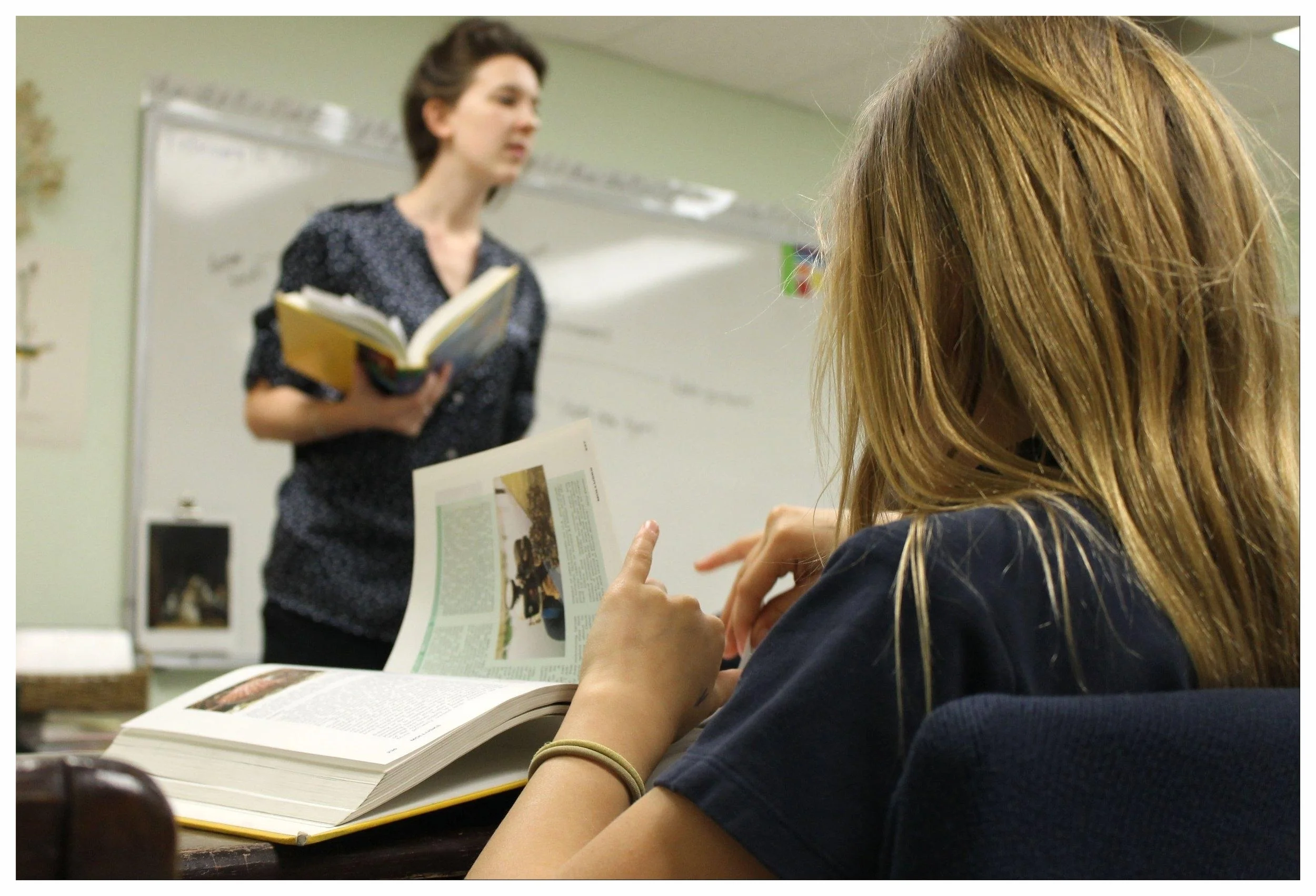 Teacher with Book.jpg