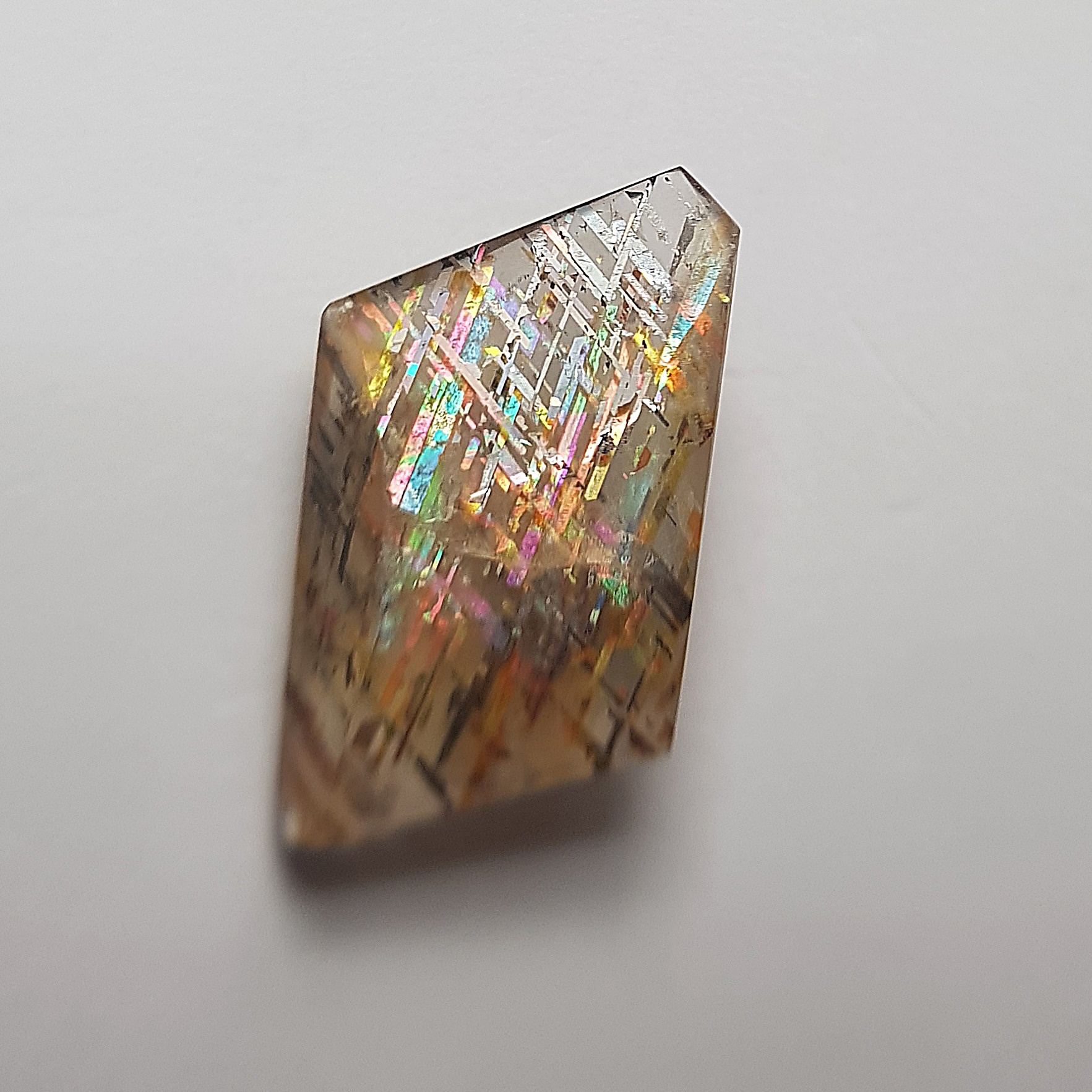 Rainbow Lattice faceted gem