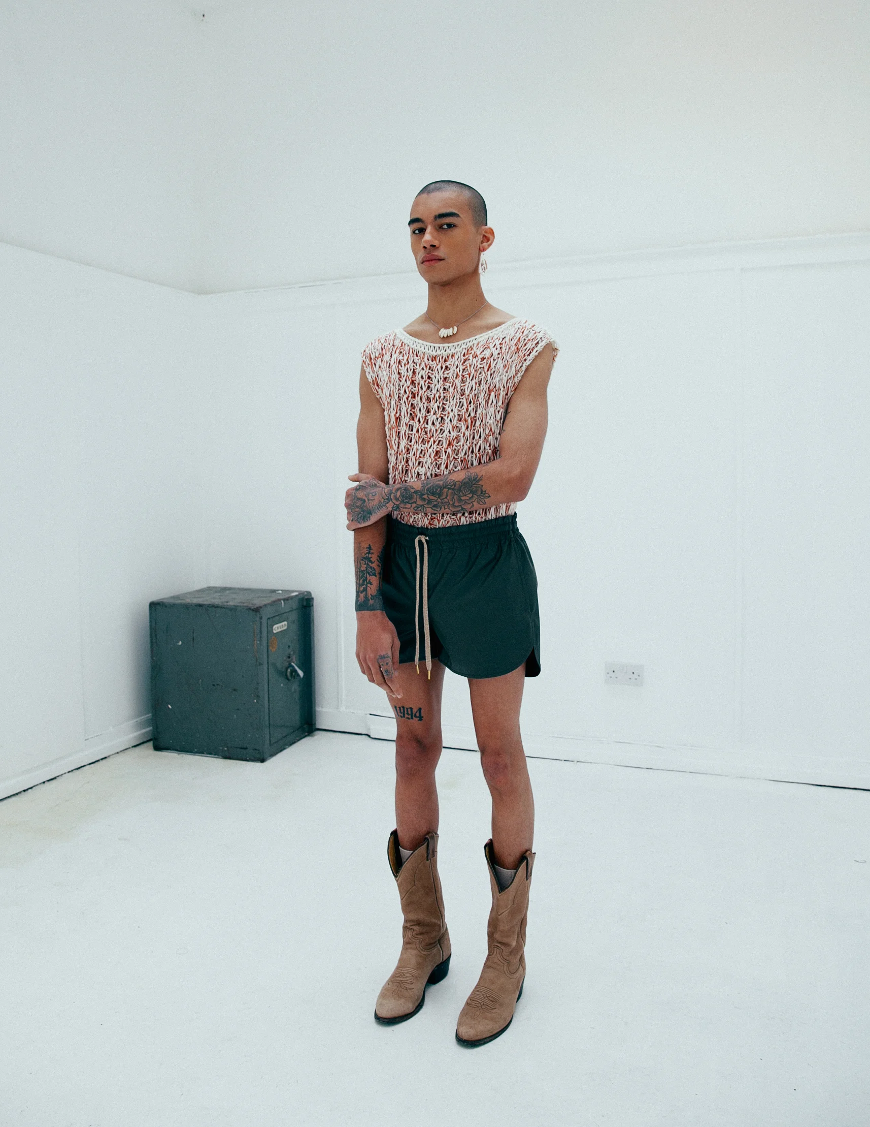White Knit Top: Market Carter | Shorts: Julian Zigerli | Boots: Window 00 | Jewelry: Stylist's Own