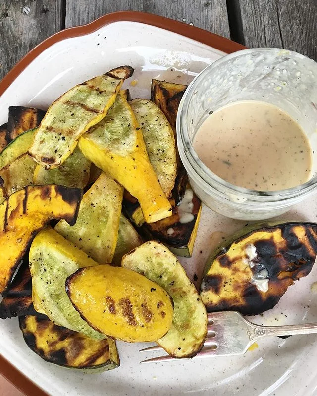 Kabocha winter squash and yellow crookneck summer squash on the BBQ. Some lemon-tahini sip on the side. Yep.