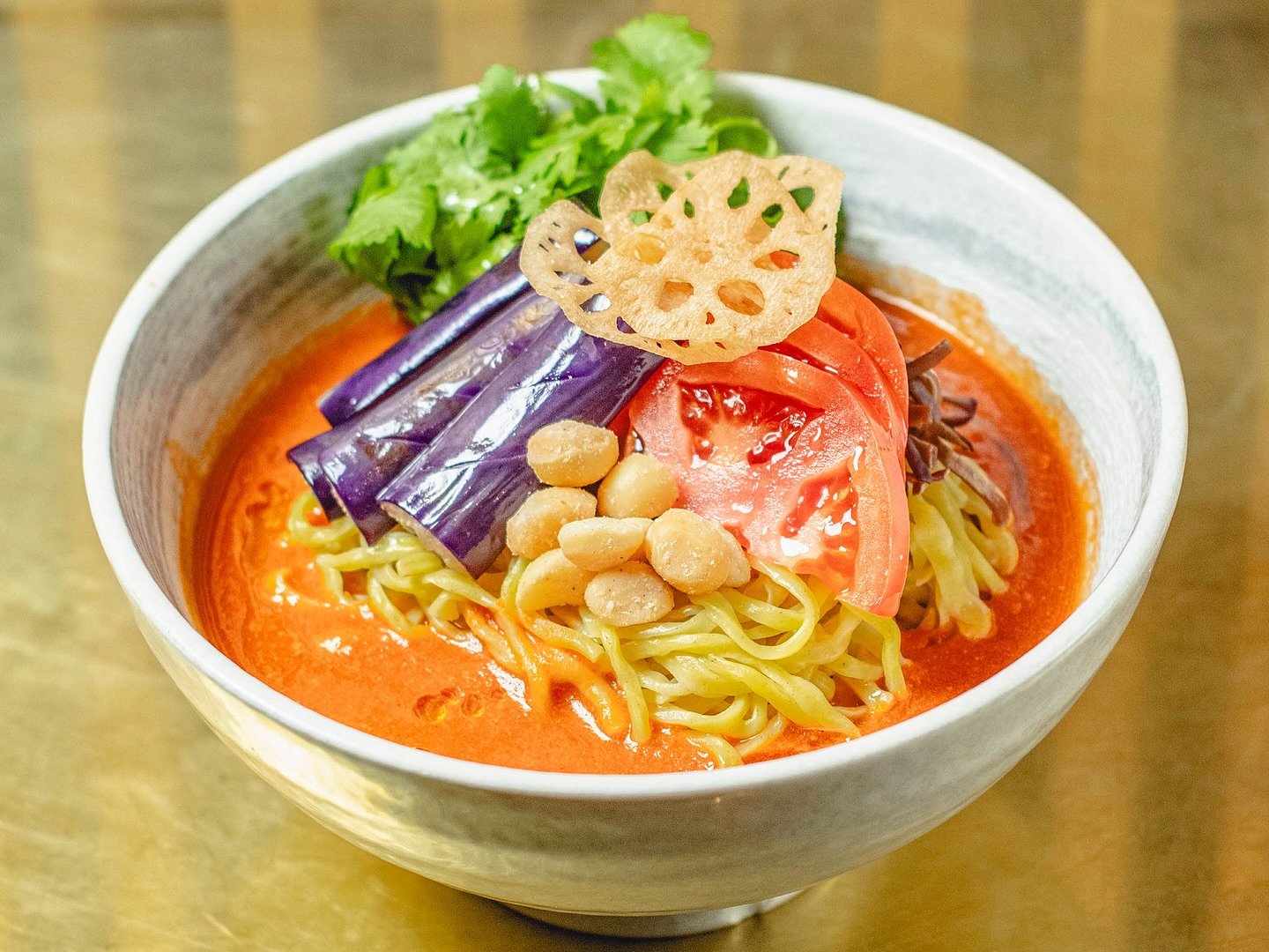 🌶️Spice up your evening with our 🍅 SPICY TOMATO RAMEN 🍜&mdash; a bold bowl of tomato broth layered with eggplant, wood ear mushrooms, macadamia nuts, fresh cilantro, and crispy renkon chips.
Now available on our dinner menu.🌙 @hi_collar 
.
.
#HiC