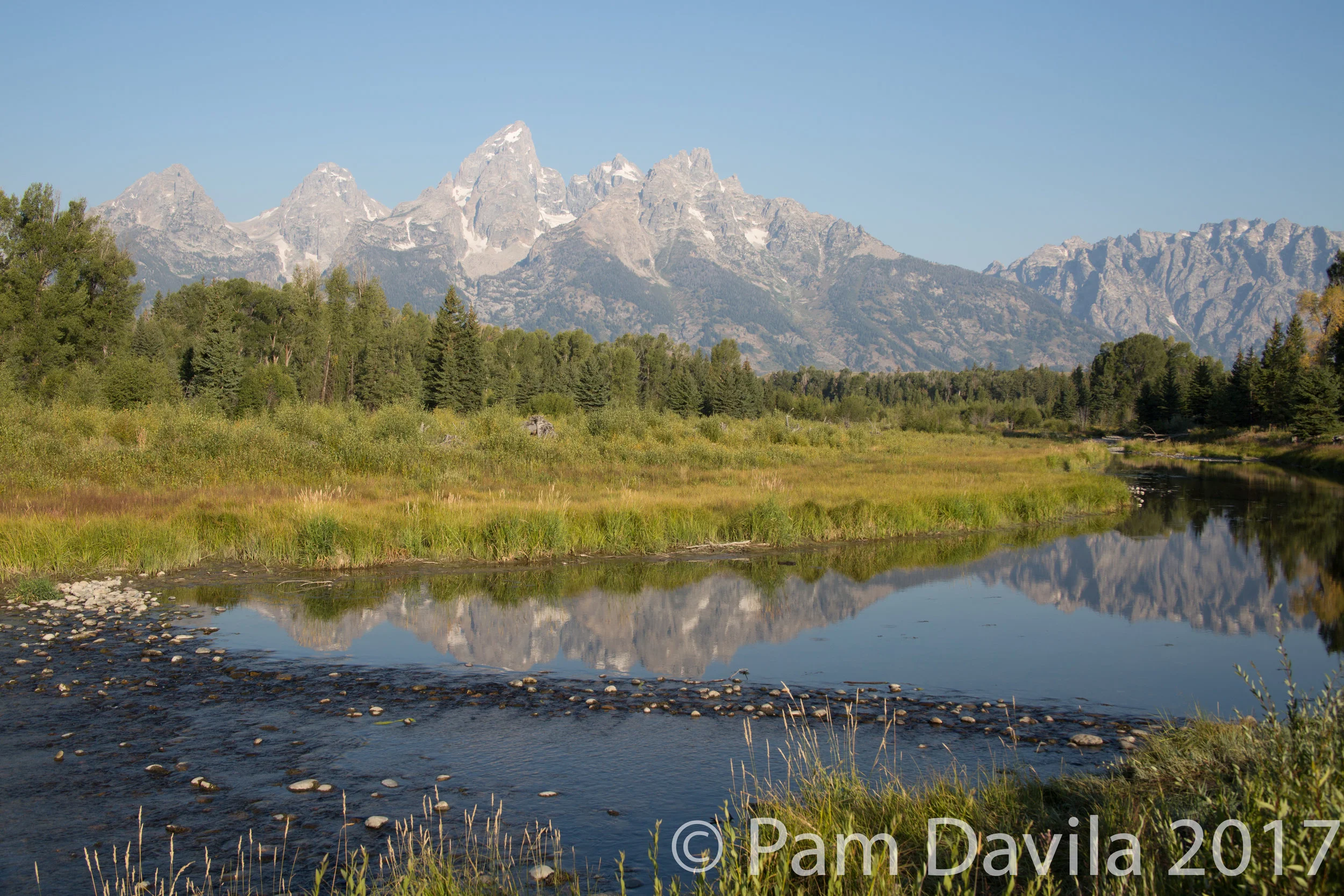 Reflection of the Teton Range in the Snake River