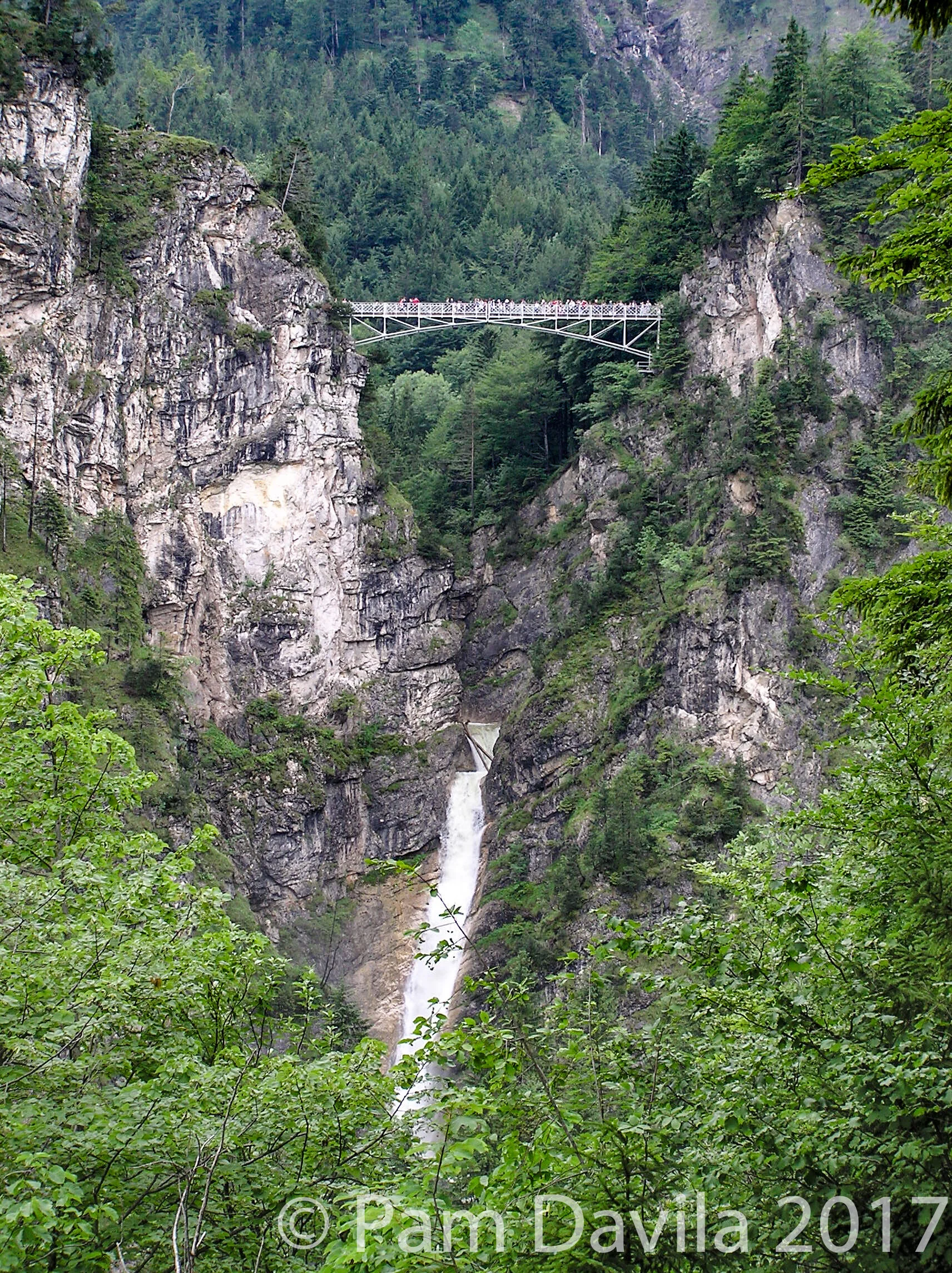 View of Marienbrücke (Mary's bridge) over waterfall in Neuschwanstein, Germany, Bavaria