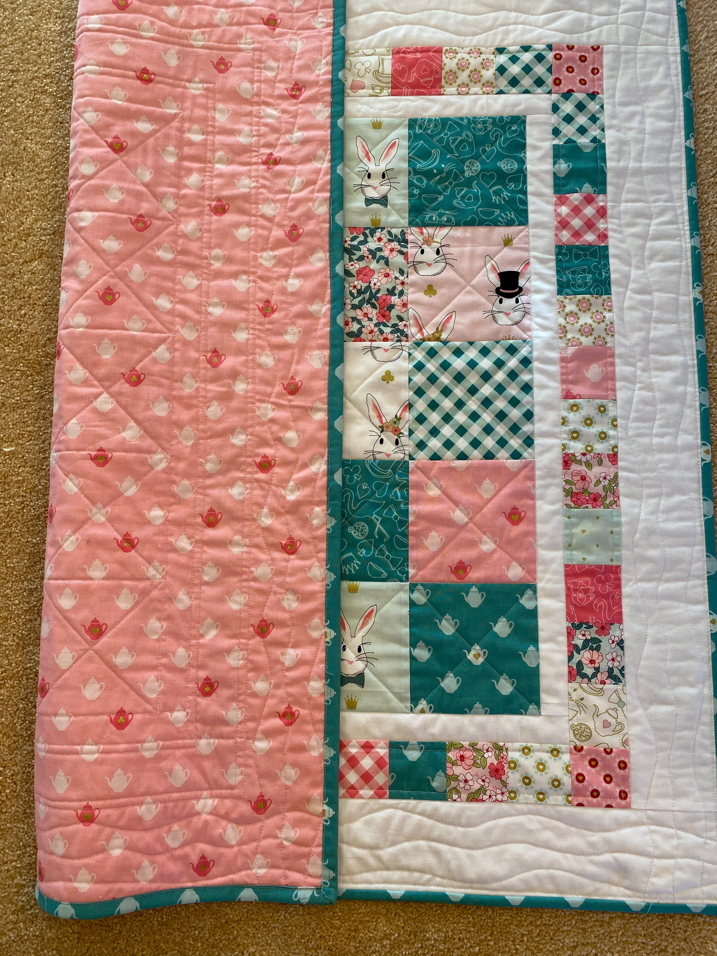 Baby Whitney quilt - front and back together