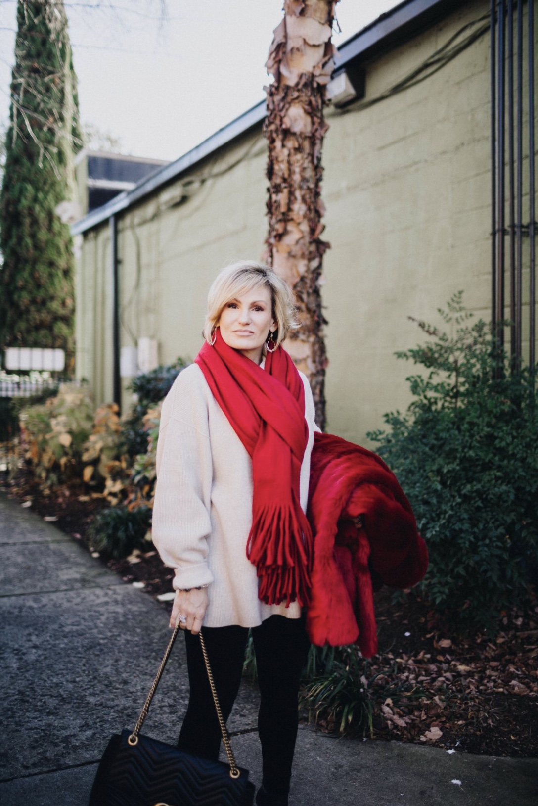 Color blocking is another way to add interest to an outfit. Add colorful removable pieces like this oversized scarf or faux fur jacket that can easily be interchanged with other colors later for another complete look. Shop similar items here. Wishin…