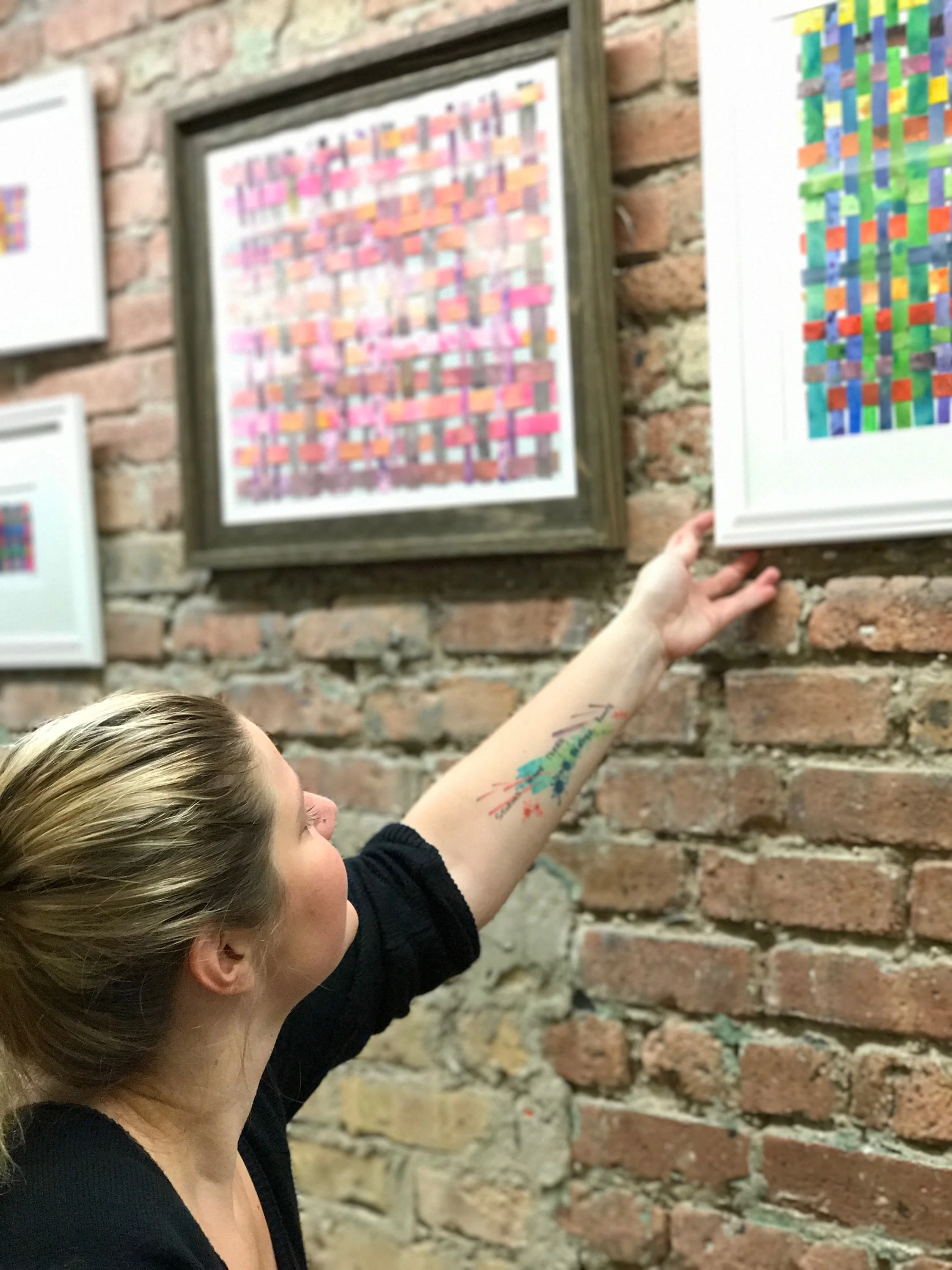 Sam Arnold mounting a custom collection at Next Door in Chicago, IL.
