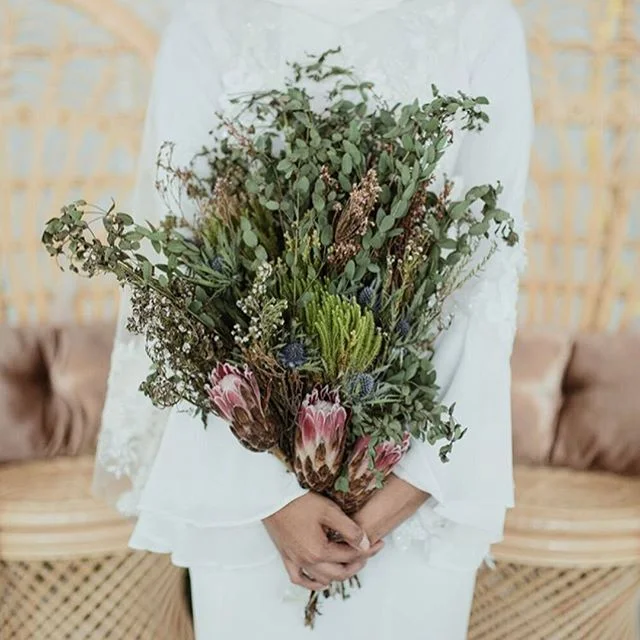 Flowers in one hand, and a lifetime of love in another 💫 Loving these snaps from a beautiful day for this perfect pair! Congratulations @saidahumairah and partner 💓
~
📸 by: @photopeoplephotography
~
#madetoorder #madetomeasure #custommade #bespoke #bespokebridal #bridaldress #bridalstyle #modernbride #hanimokhta