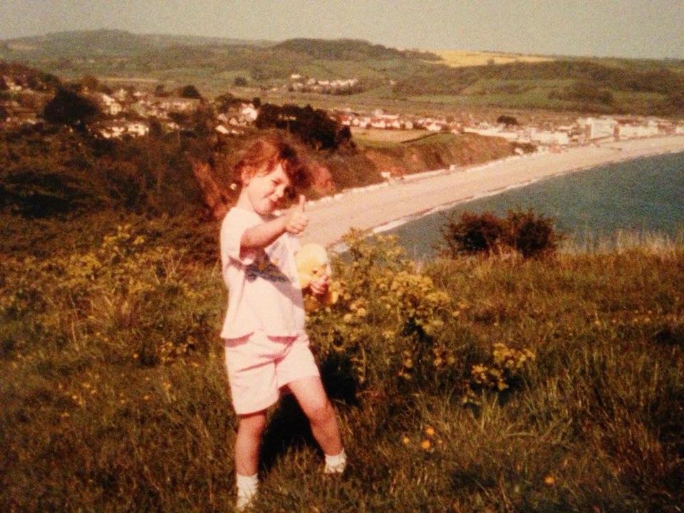 Charlotte Katherine – "In the late 80s/early 90s doing a favourite clifftop walk in Devon. I always had to take a cuddly toy on my walks."