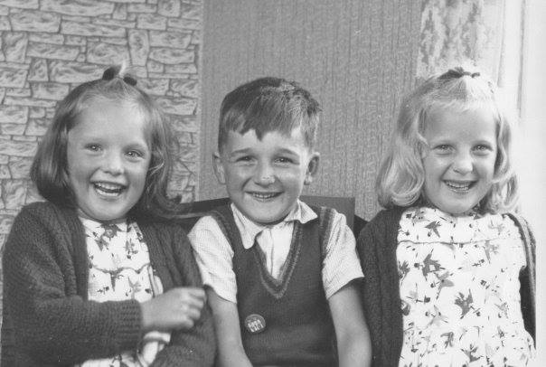 Sonia Jenkins – "Me Circa 1962 with my twin sister and brother. Check out those dresses - almost as good as my Cowgirl Cossie for the MoonWalk."