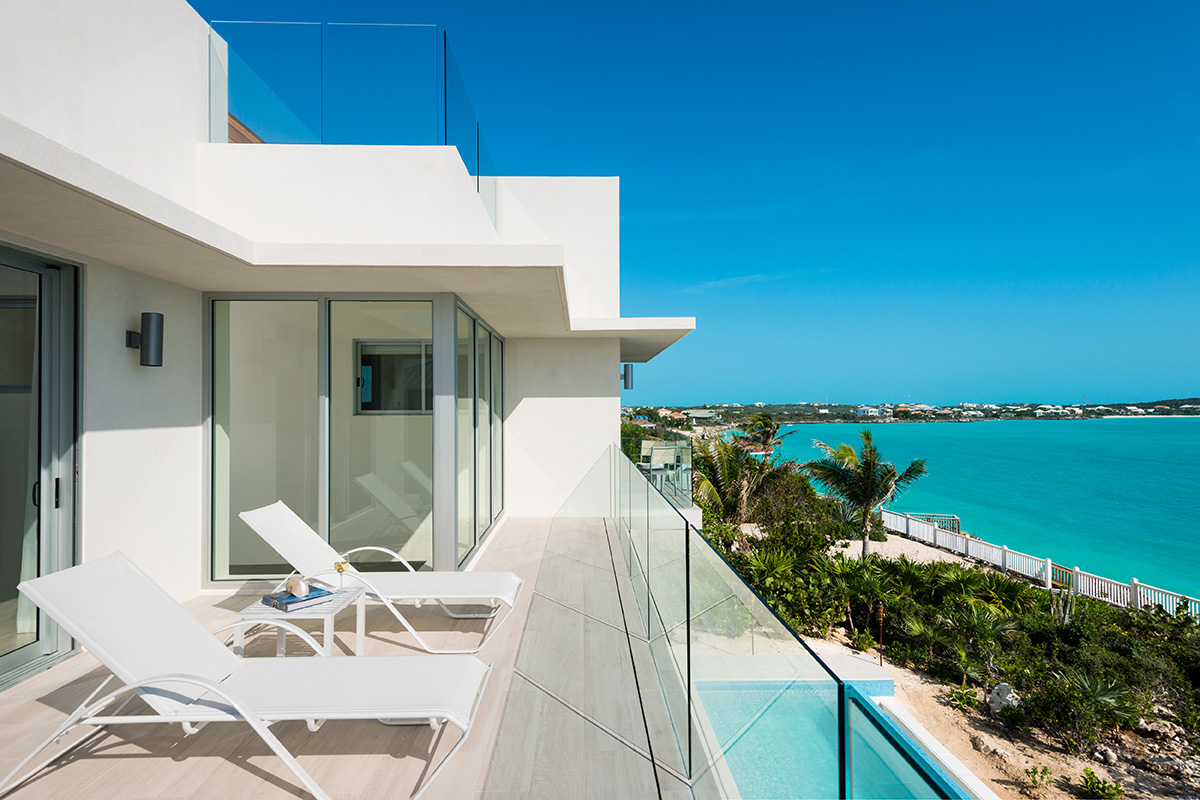 Villa Sol Y Luna glass rail and fixed window.jpg