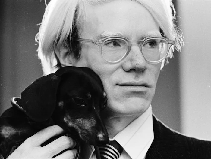 Warhol and his dog Archie (Photograph by Jack Mitchell, 1973)