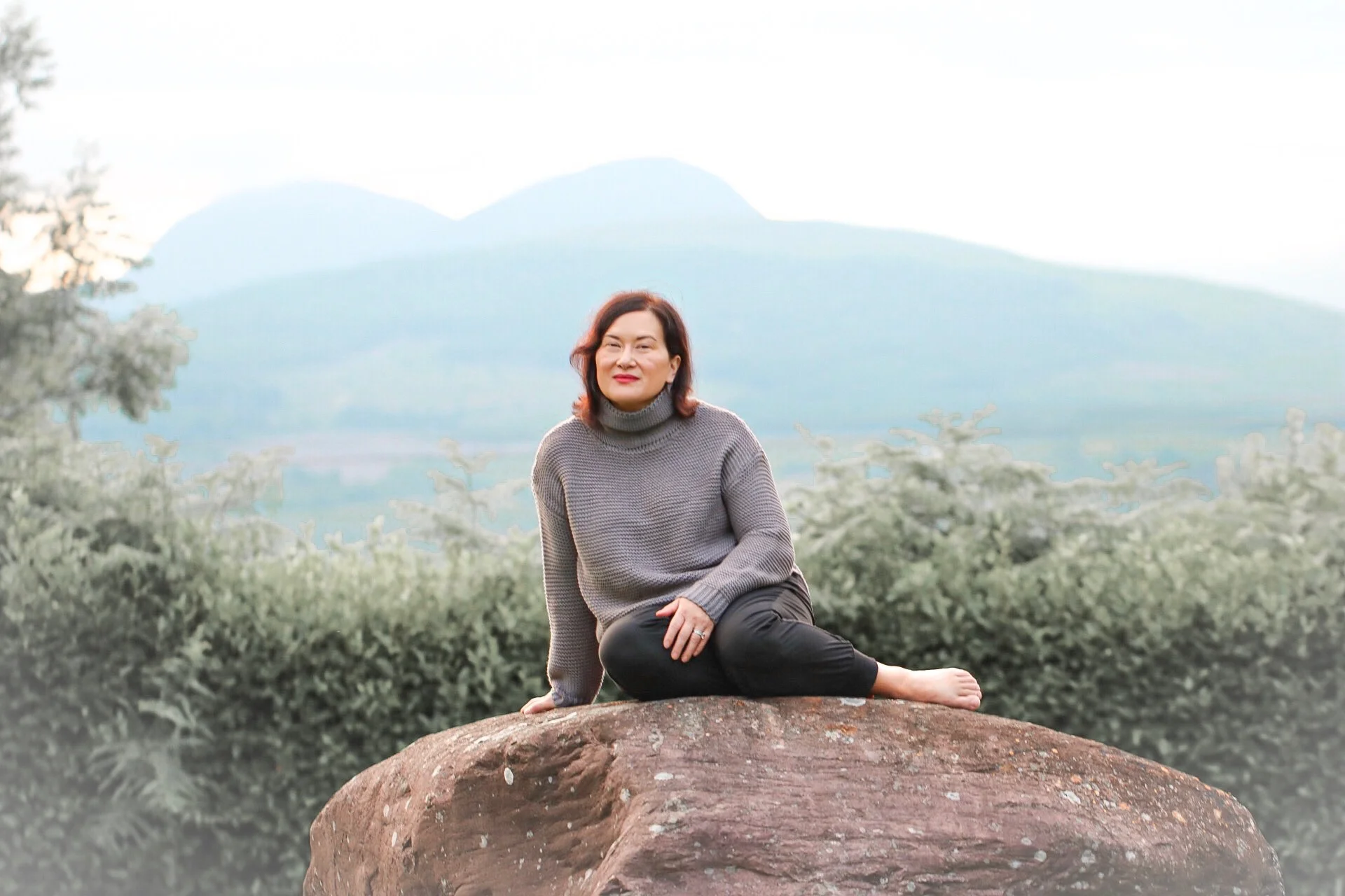 I haven’t been to Hawai’i since January, so I decided to post this more recent photo instead, because I’m sitting in front of a mountain, even though it’s not Mauna Kea!