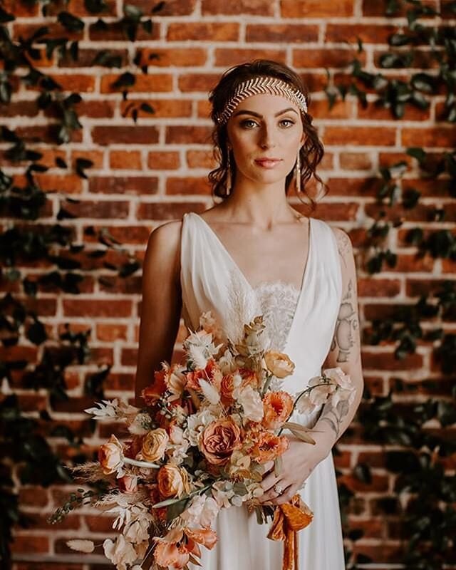 One day we&rsquo;ll get back to doing hair and makeup for styled shoots (and brides) like this and we can&rsquo;t wait. 🧡 Until then check out this shoot on the @engagedasheville blog! 
Makeup by Joanna &amp; Hair by Hannah 
Planning: @mingleevents 