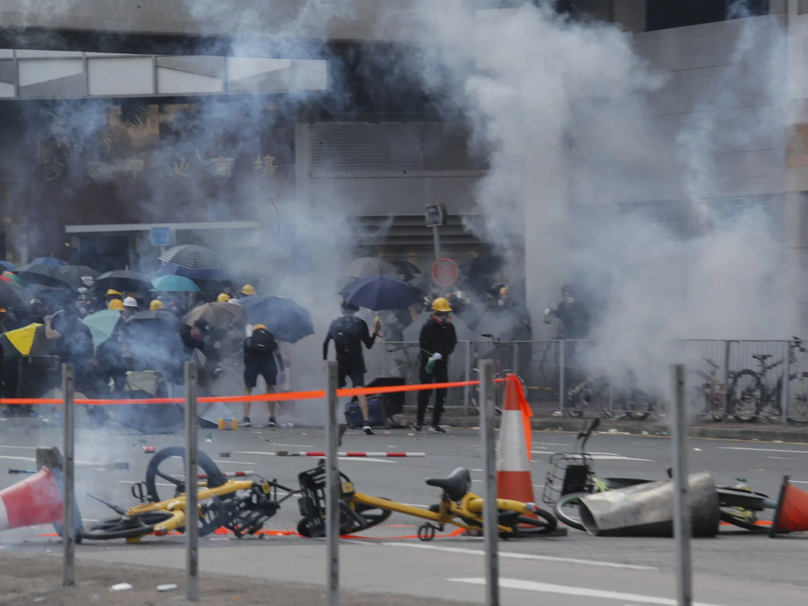 The police in Hong Kong shot a pro-democracy protester Tuesday for the first time. Photo courtesy: Kin Cheung | AP
