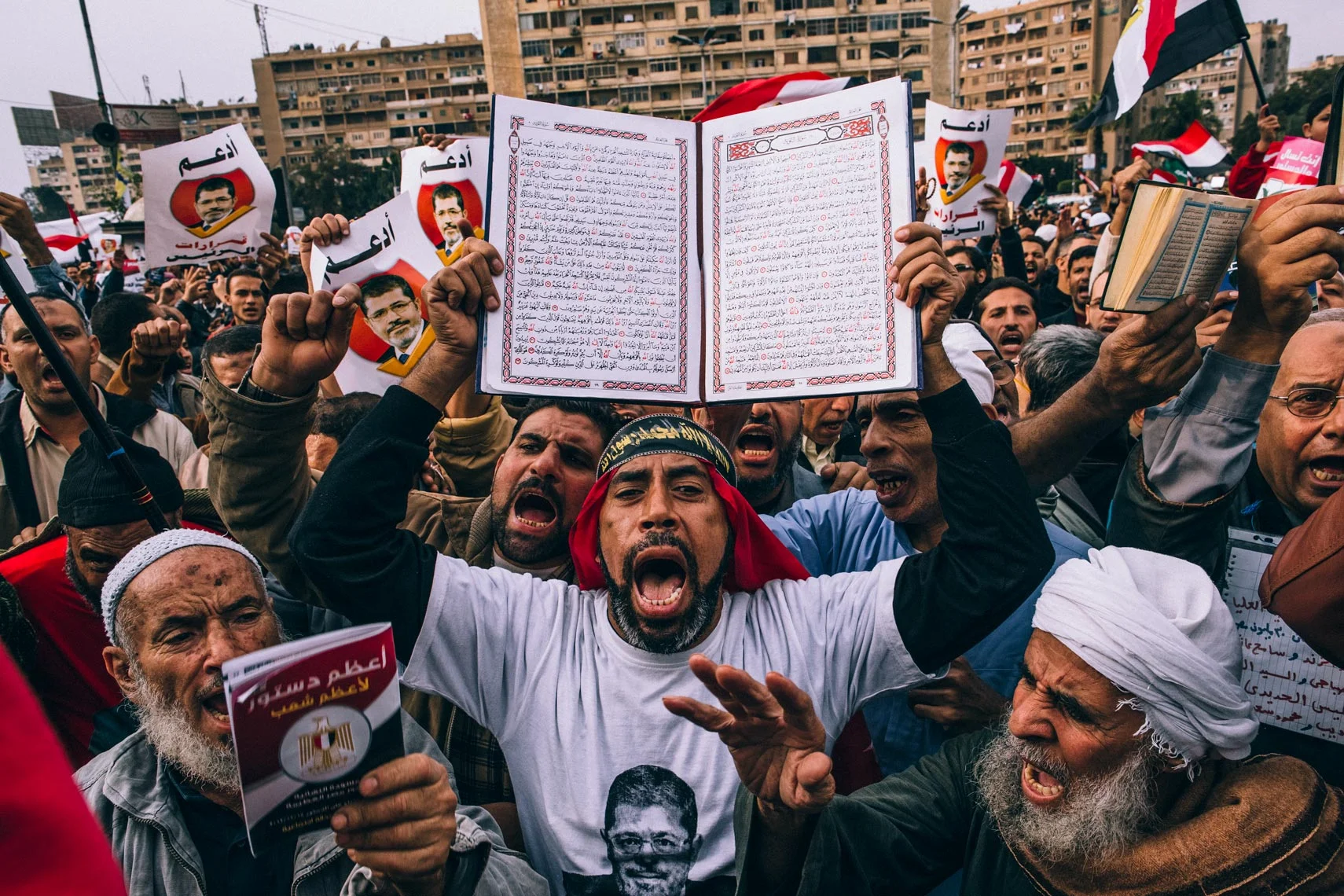 Hosni Mubarak was ousted from office during the Arab Spring in February of 2012. On June 14, just days before the country's first democratic presidential elections, the Supreme Constitutional Court dissolved Egypt's Islamist-majority parliament. The elections themselves were further marred by confusion when election officials delayed the announcement of a winner, saying they needed more time to investigate charges of electoral abuse. After the vote, which took place on June 17, supporters of Muslim Brotherhood candidate Mohamed Morsy have been gathering daily in Tahrir Square. On Sunday, an official announcement declared Morsy the winner and the tension that had been brewing in the crowds all week quickly transformed into euphoria.