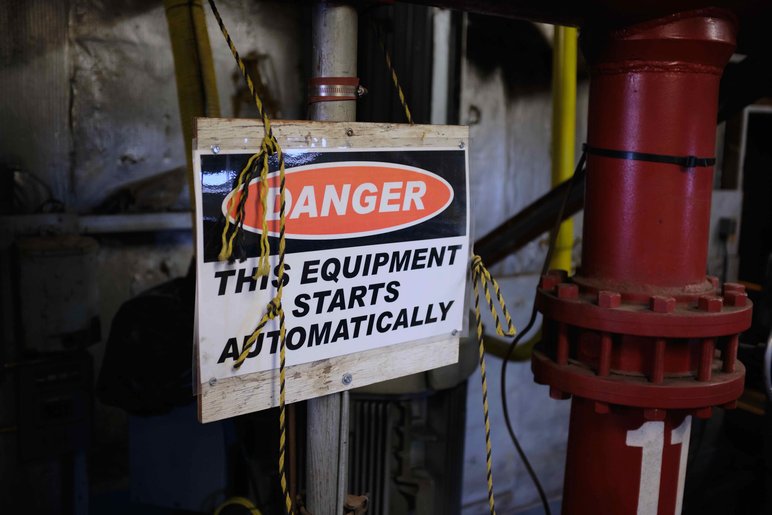  The volume of the noise in the pump house is such that conversations are nearly impossible even at a shout. Machinery activates and shuts down via control mechanisms outside the room, and the fright of a pump activating without warning is an experie