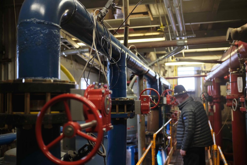  Manifolds and gate valves create a web of water lines in the pump room. 