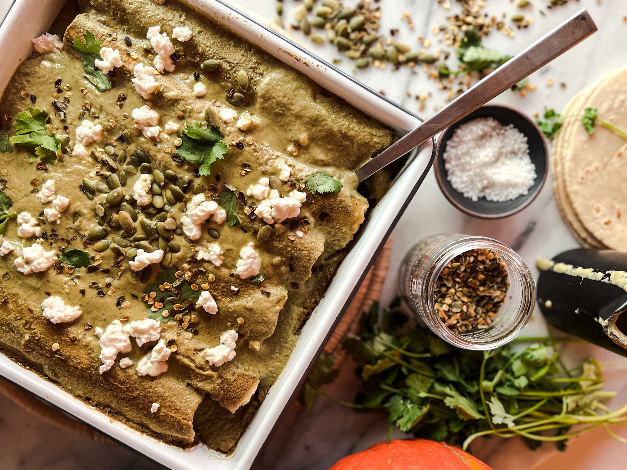 Veggie and black bean enchiladas with roasted pepita sauce.jpg