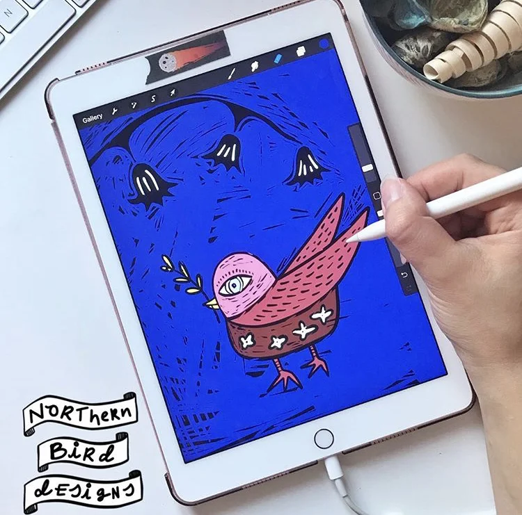 ipad flatlay northern bird designs.jpg