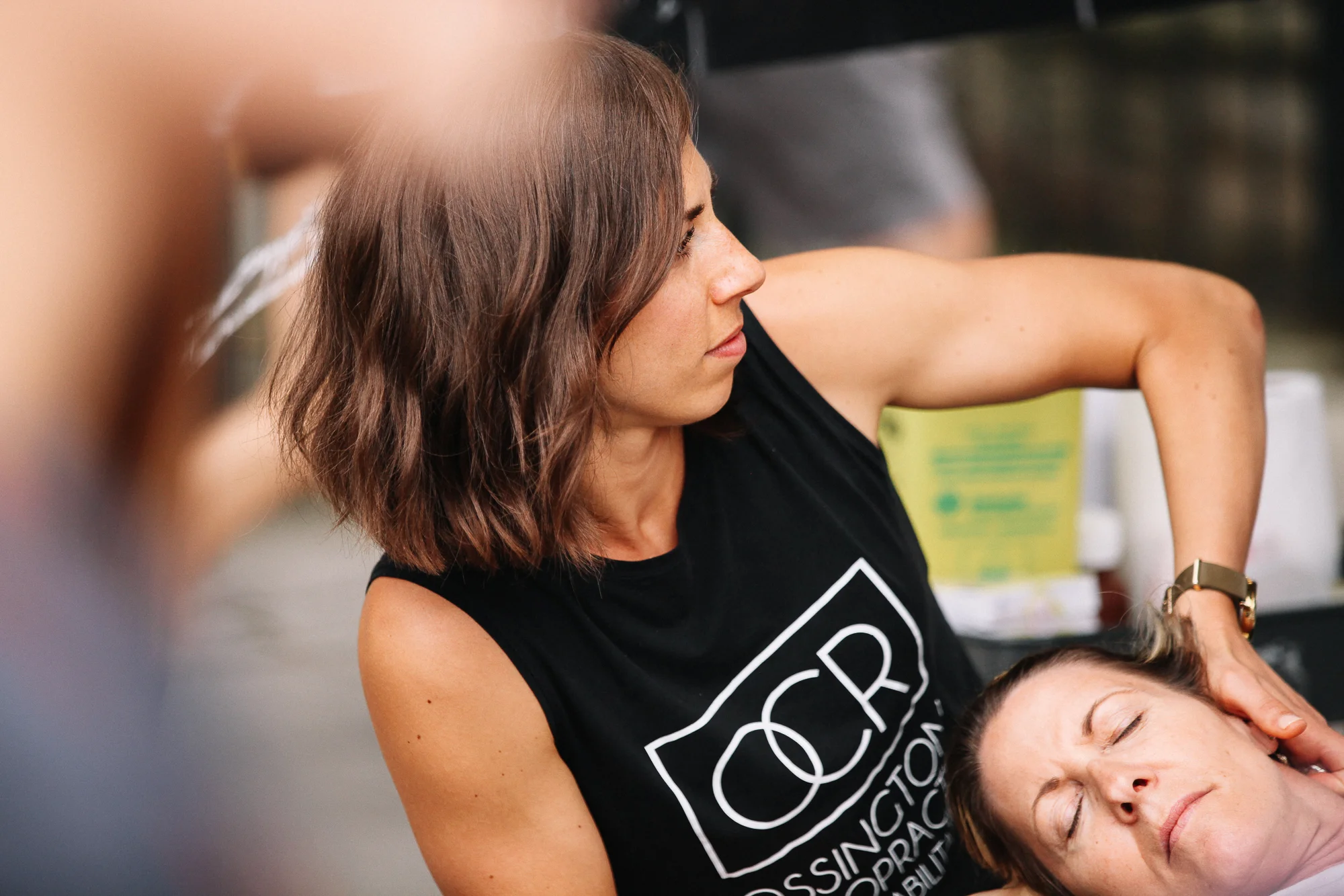 chiropractor, Dr. Andrea providing neck treatment