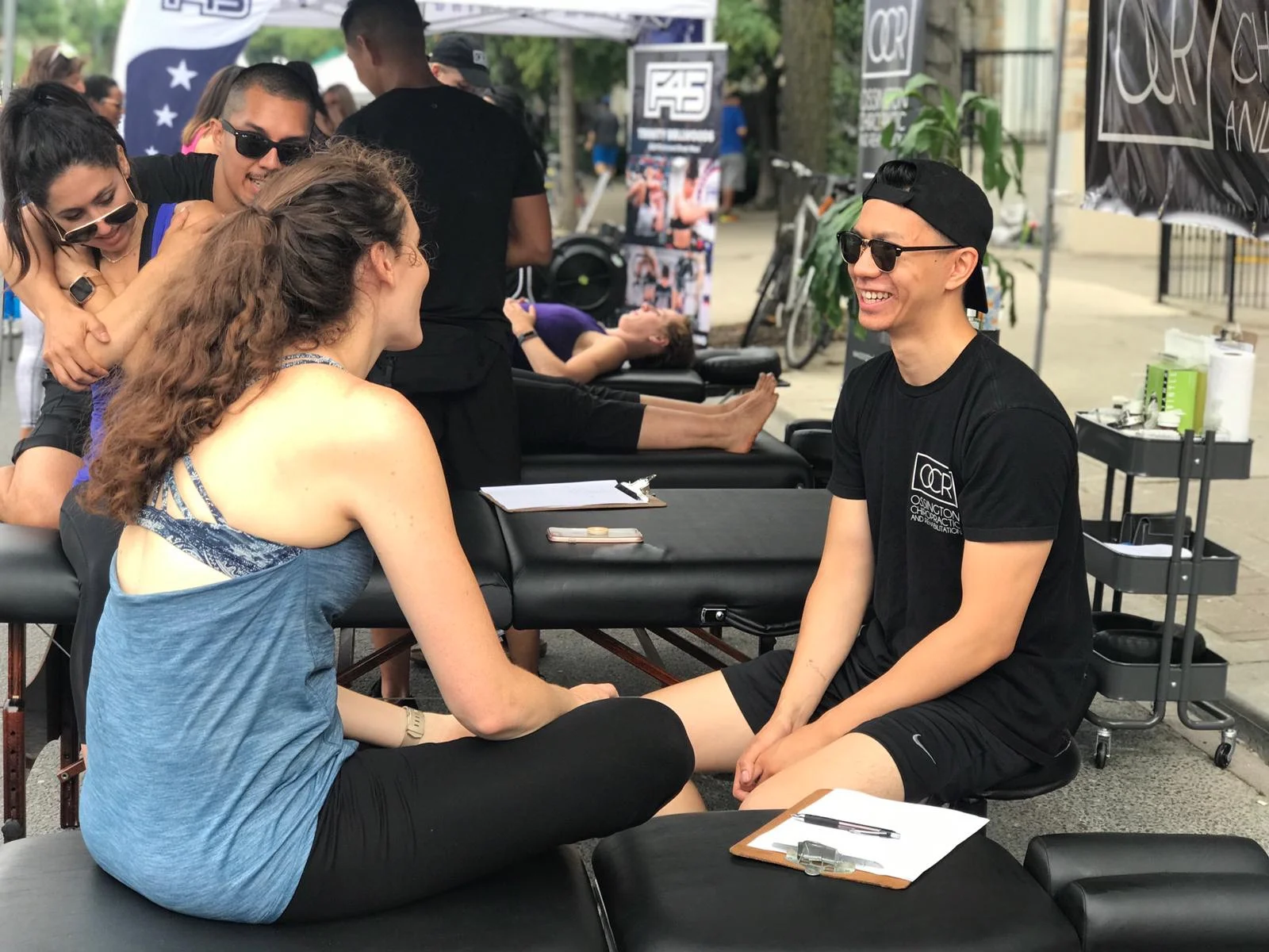 physiotherapist, Justin consulting patient