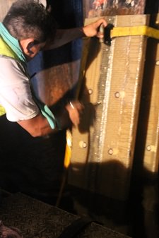 Fiberglass jacket being installed on cleaned H-Pile