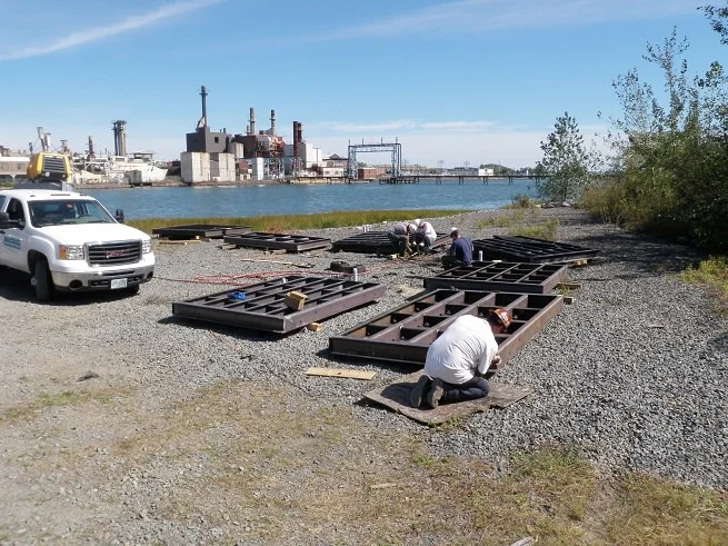 Newly designed stoplogs receiving final preparation prior to installation