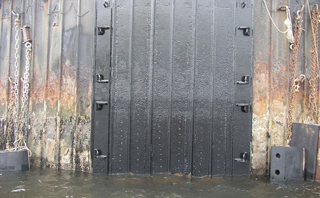 Different areas of corrosion are shown on an older port fender system.