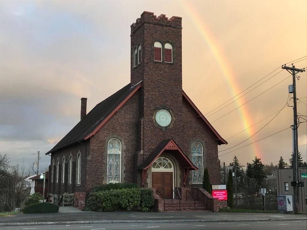 3.4.2022 Rainbow and church with new sign.jpg