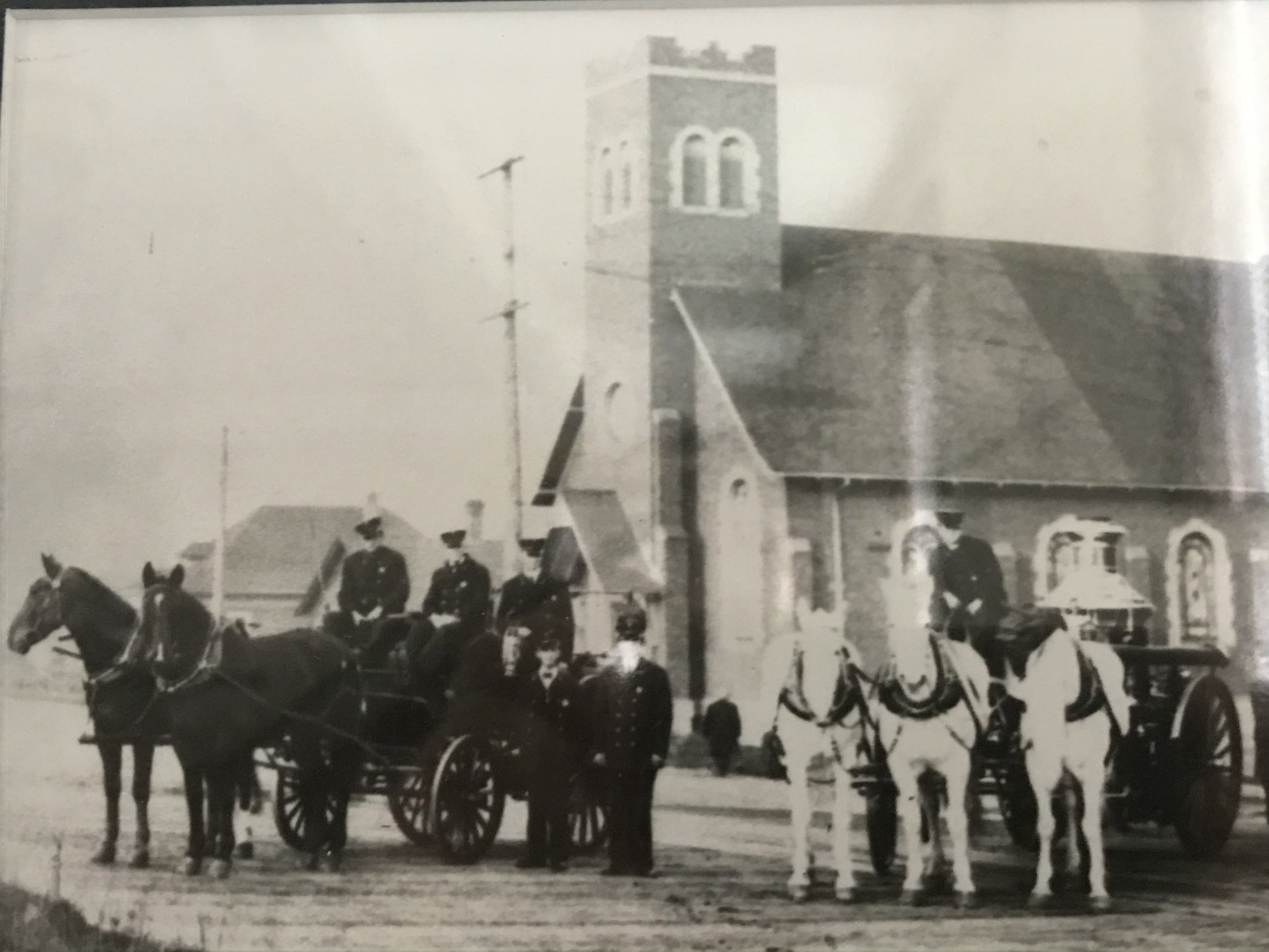 1913 - Firefighters from Tacoma Fire Department’s Station No. 2 in front of St. Paul Lutheran Church