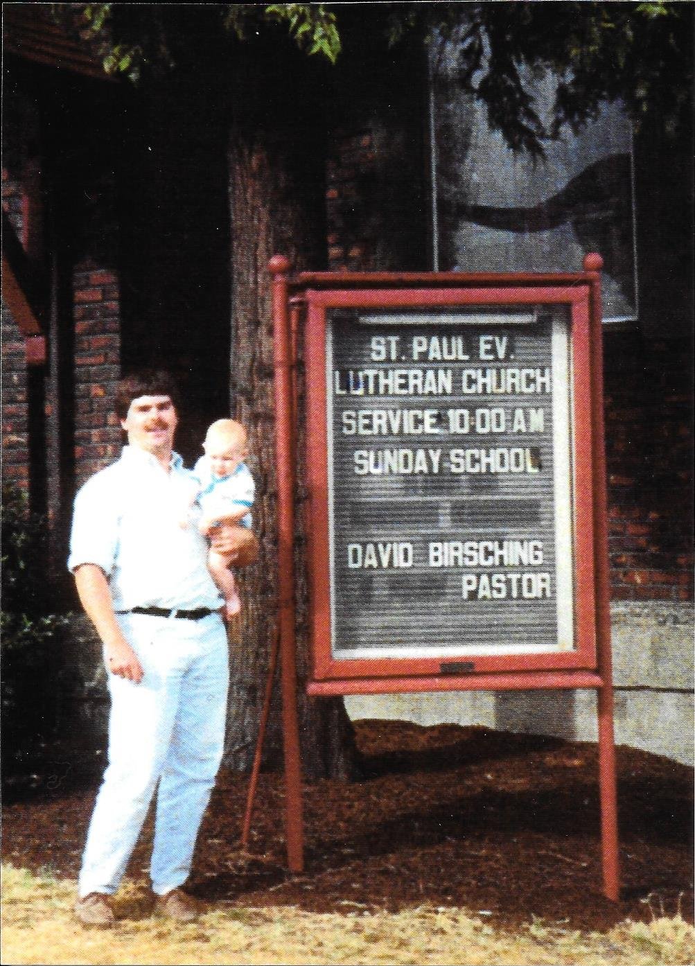 Pastor Birsching in front of St. Paul (Date Unknown). Pastor Birsching served at St. Paul from 1990-2023.