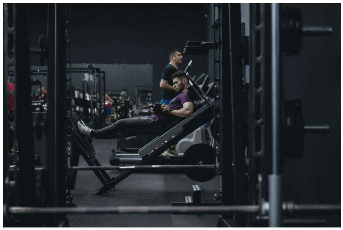 gym with leg curl machine