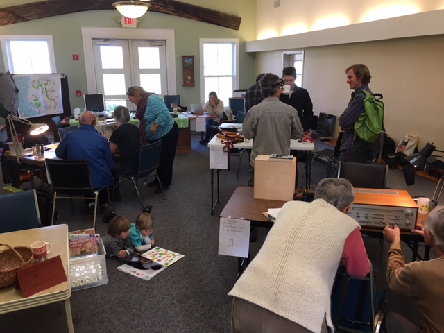  Transitioners of all ages participate in Transition Town Charlotte's first repair cafe in 2017. Photo courtesy of Ruah Swennerfelt.