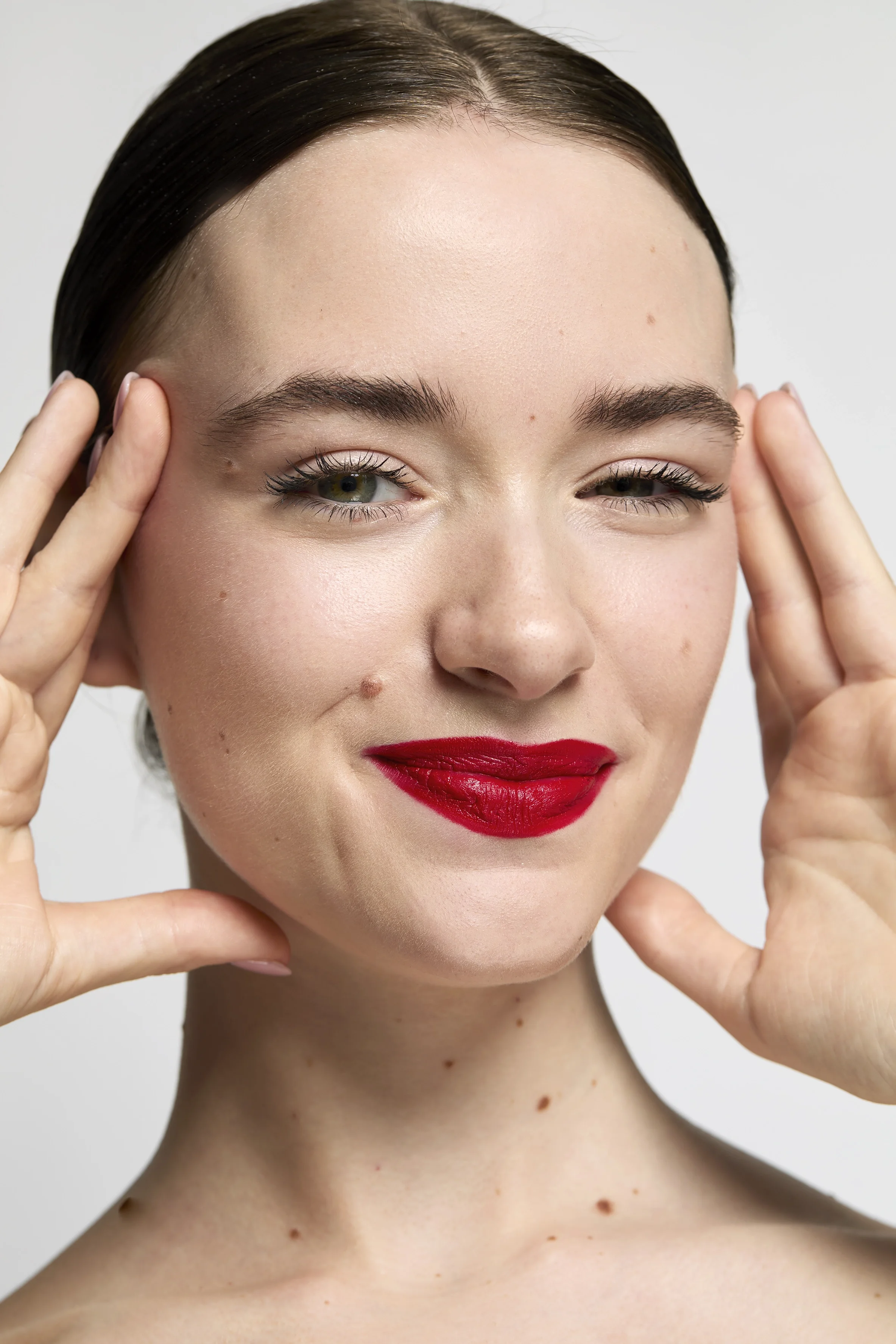  beauty shot of a model with red lipstick,  skincare photoshoot, beauty photography, skincare photography, Egle Vasi, beauty photographer, beauty photographer London, beauty photographer Bristol 
